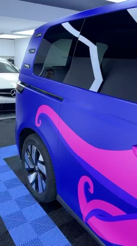 Volkswagen ID. Buzz with neon-pink tentacle wrap